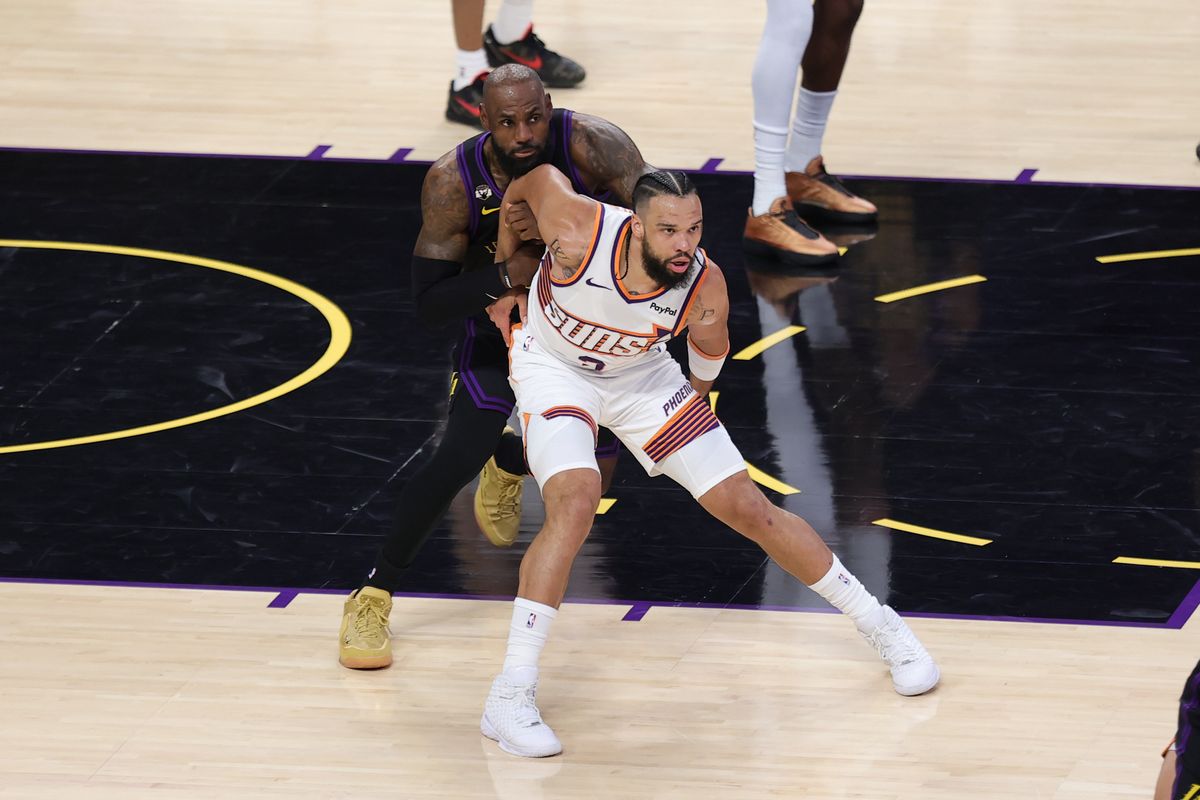 Los Angeles Lakers forward LeBron James (23) battles for position with Phoenix Suns guard Dillon Brooks (3) during an NBA game on April 10, 2026 in Los Angeles, CA.