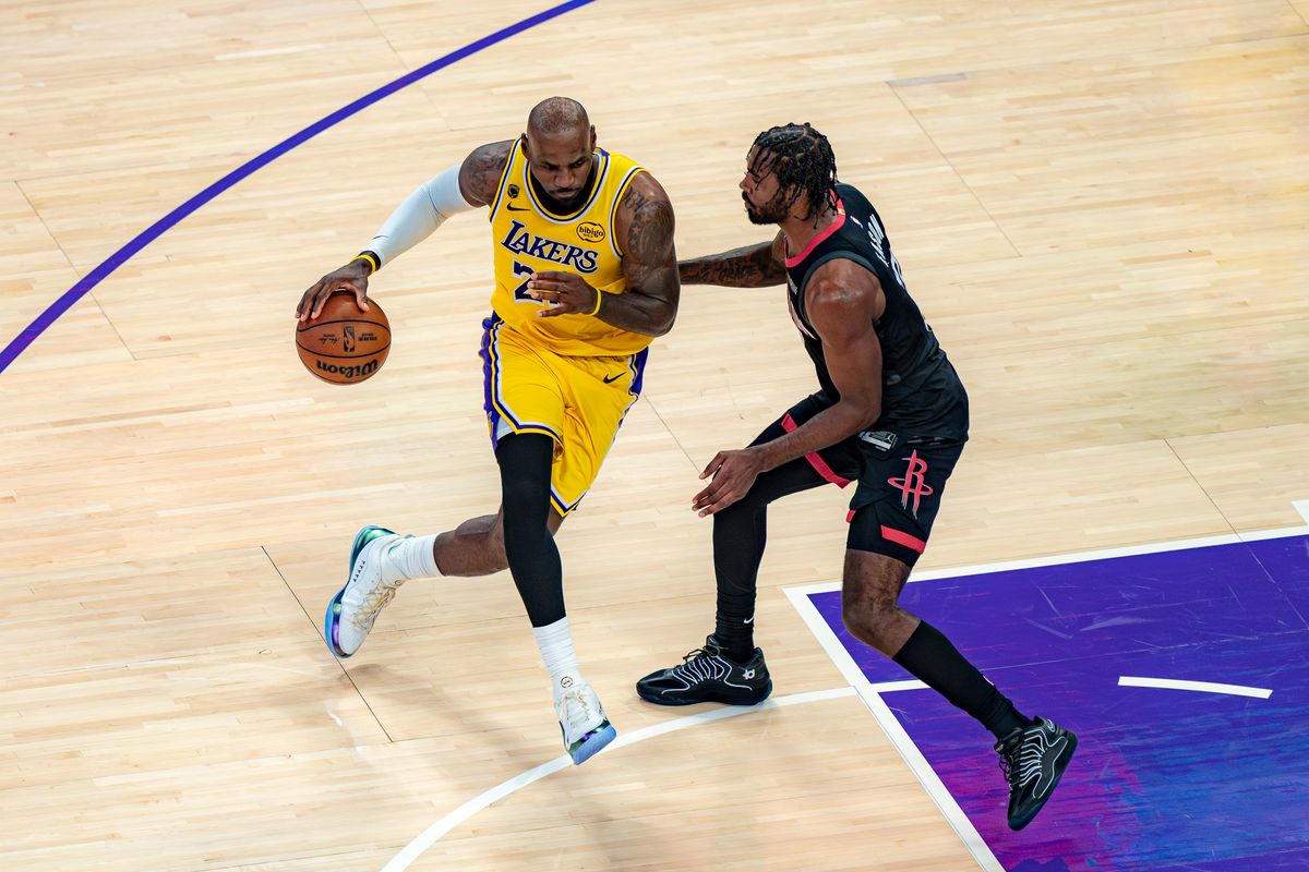 Los Angeles Lakers forward LeBron James (23) dribbling past a rockets guard during an NBA basketball game against the Houston Rockets on April 18th, 2026 in Los Angeles, CA.