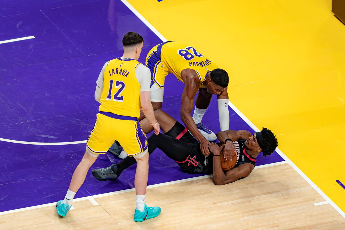 Los Angeles Lakers forward Rui Hachimura (28) trying to recover the ball during an NBA basketball game against the Houston Rockets on April 18th, 2026 in Los Angeles, CA.