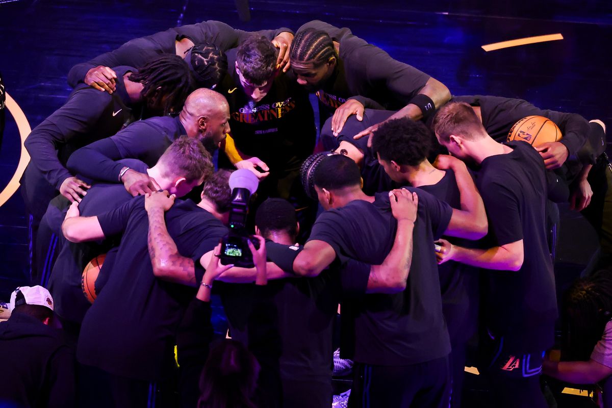 The Los Angeles Lakers huddle before an NBA Playoffs basketball game against the Houston Rockets, Tuesday April 21, 2026 in Los Angeles, Calif.