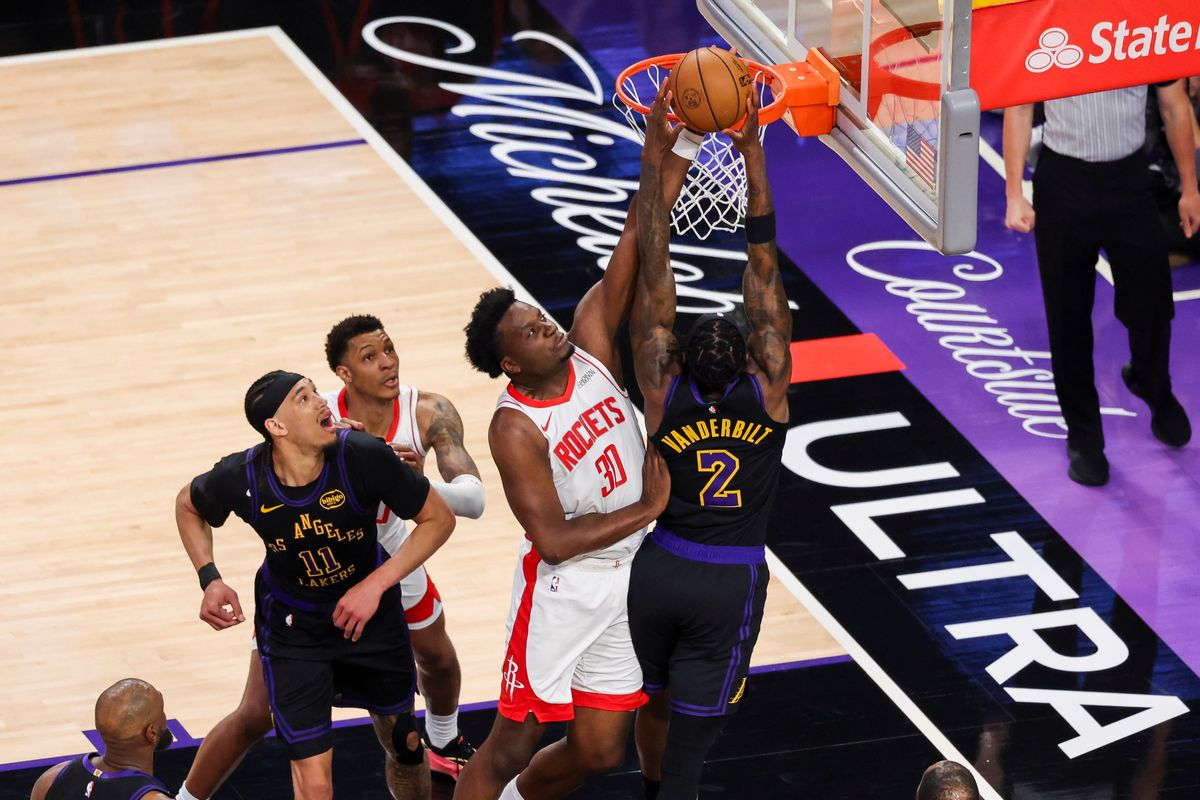 Clint Capela #30 of the Houston Rockets blocks the dunk attempt by Jarred Vanderbilt #2 of the Los Angeles Lakers during an NBA Playoffs basketball game, Tuesday April 21, 2026 in Los Angeles, Calif.