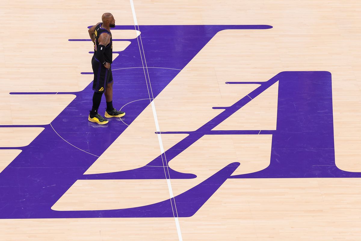 LeBron James #23 of the Los Angeles Lakers stands at center court during an NBA Playoffs basketball game against the Houston Rockets, Tuesday April 21, 2026 in Los Angeles, Calif.