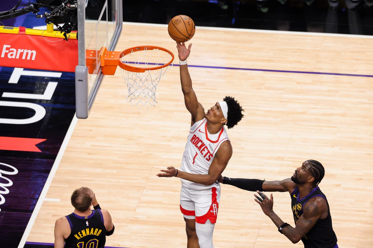Amen Thompson #1 of the Houston Rockets lays the ball up during an NBA Playoffs basketball game against the Los Angeles Lakers, Tuesday April 21, 2026 in Los Angeles, Calif.