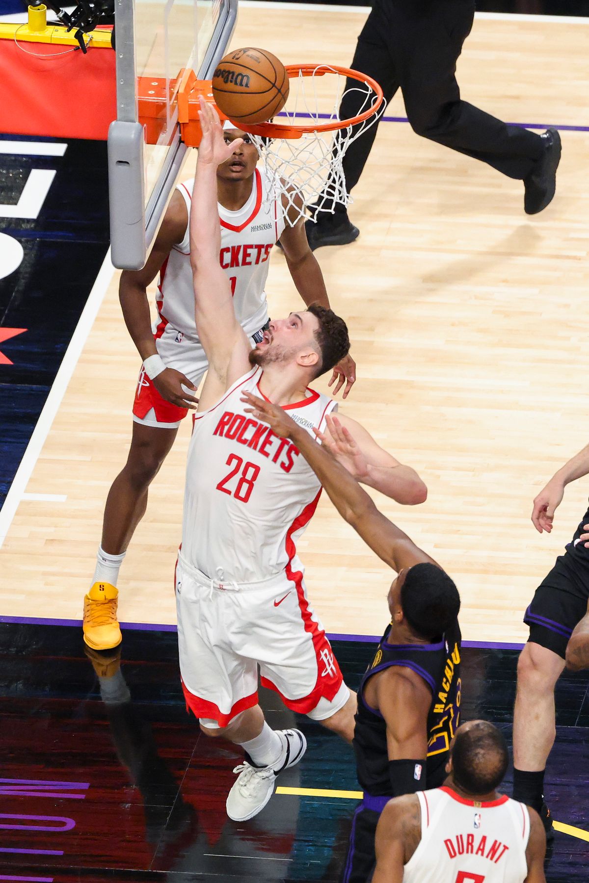 Alperen Sengun #28 of the Houston Rockets lays the ball up during an NBA Playoffs basketball game against the Los Angeles Lakers, Tuesday April 21, 2026 in Los Angeles, Calif.