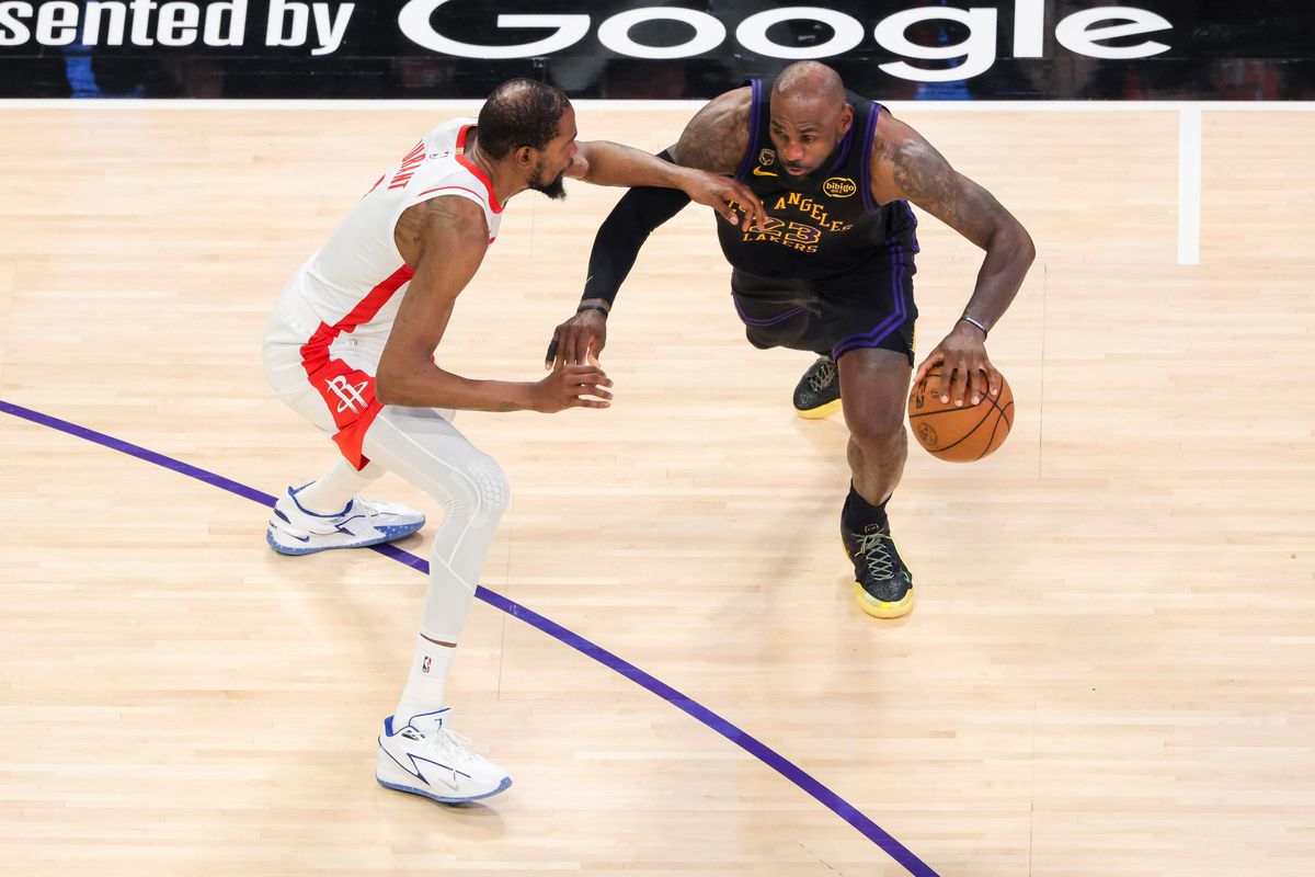 LeBron James #23 of the Los Angeles Lakers handles the ball against Kevin Durant #7 of the Houston Rockets during an NBA Playoffs basketball game, Tuesday April 21, 2026 in Los Angeles, Calif.
