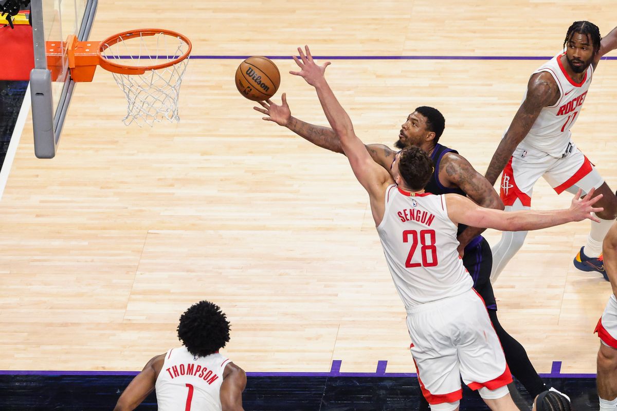 Marcus Smart #36 of the Los Angeles Lakers lays the ball up past Alperen Sengun #28 of the Houston Rockets during an NBA Playoffs basketball game, Tuesday April 21, 2026 in Los Angeles, Calif.