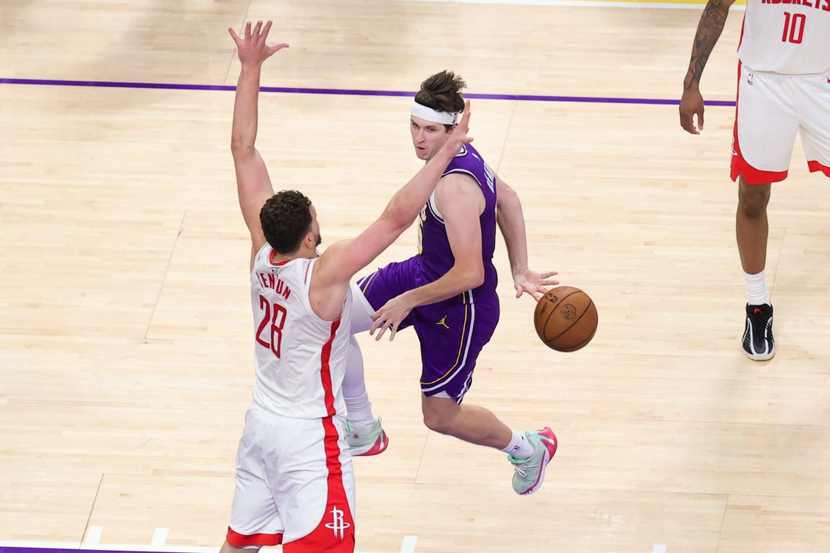 Los Angeles Lakers guard Austin Reaves (15) passes the basketball during an NBA playoffs game against the Houston Rockets on April 29, 2026 in Los Angeles, CA.