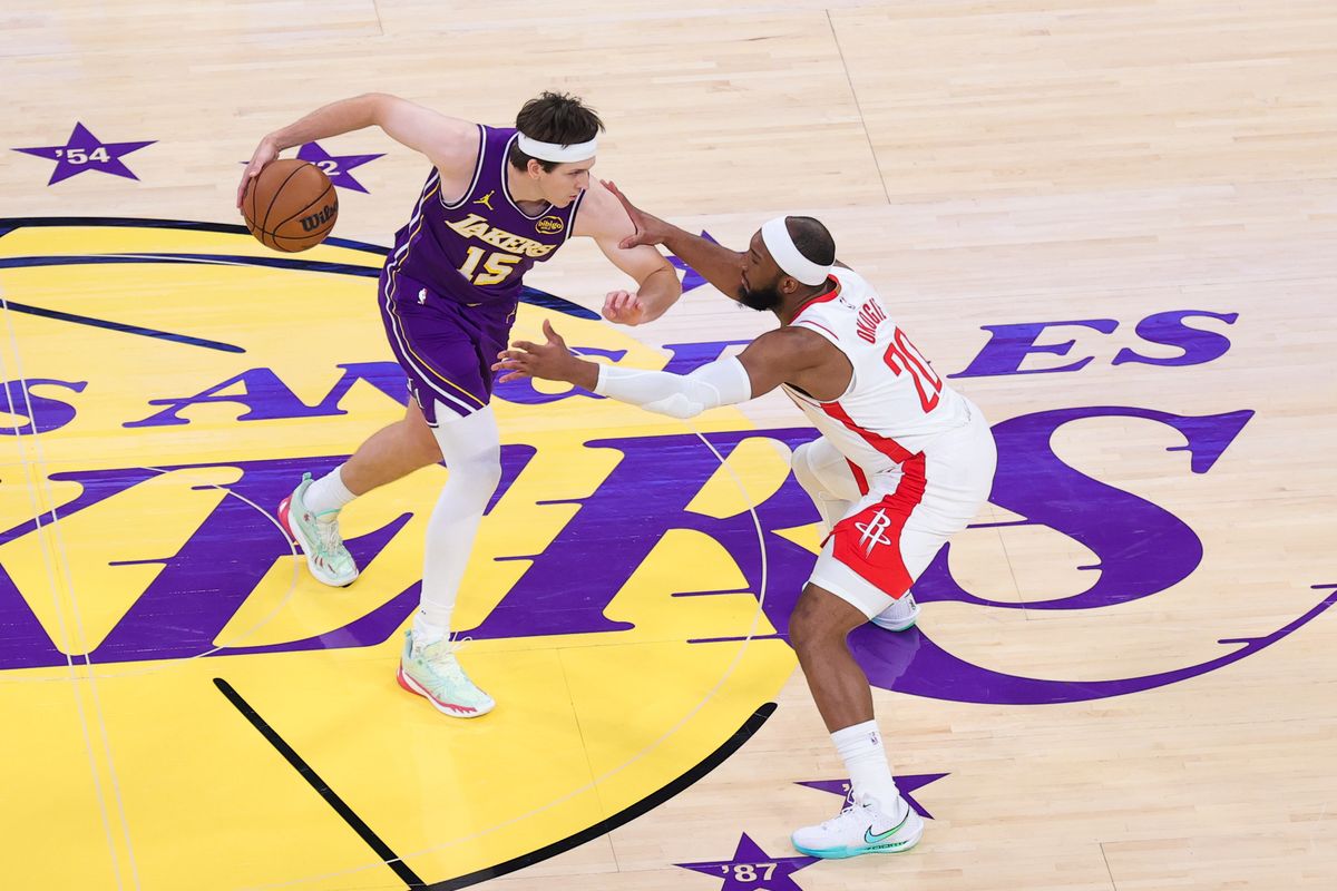 Los Angeles Lakers guard Austin Reaves (15) dribbles the basketball during an NBA playoffs game against the Houston Rockets on April 29, 2026 in Los Angeles, CA.