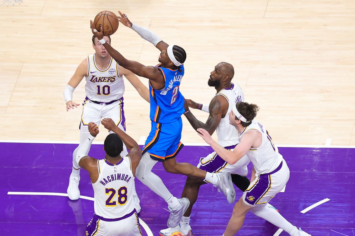 Los Angeles Lakers players collapse on Oklahoma City Thunder guard Shai Gilgeous-Alexander (2) during an NBA playoff game on May 9, 2026 in Los Angeles, CA. Los Angeles Lakers players collapse on Oklahoma City Thunder guard Shai Gilgeous-Alexander (2) during an NBA playoff game on May 9, 2026 in Los Angeles, CA.