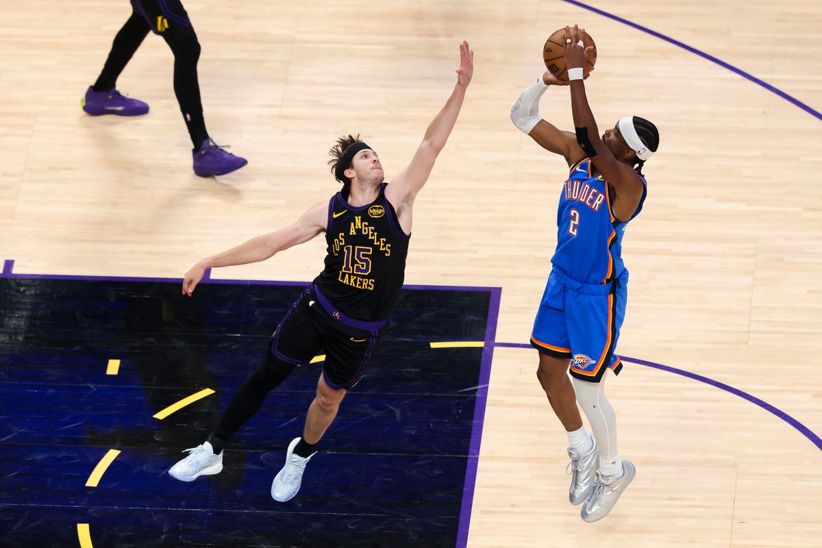 Shai Gilgeous-Alexander #2 of the Oklahoma City Thunder shoots over Austin Reaves #15 of the Los Angeles Lakers during an NBA Playoffs basketball game, Monday May 11, 2026 in Los Angeles, Calif.