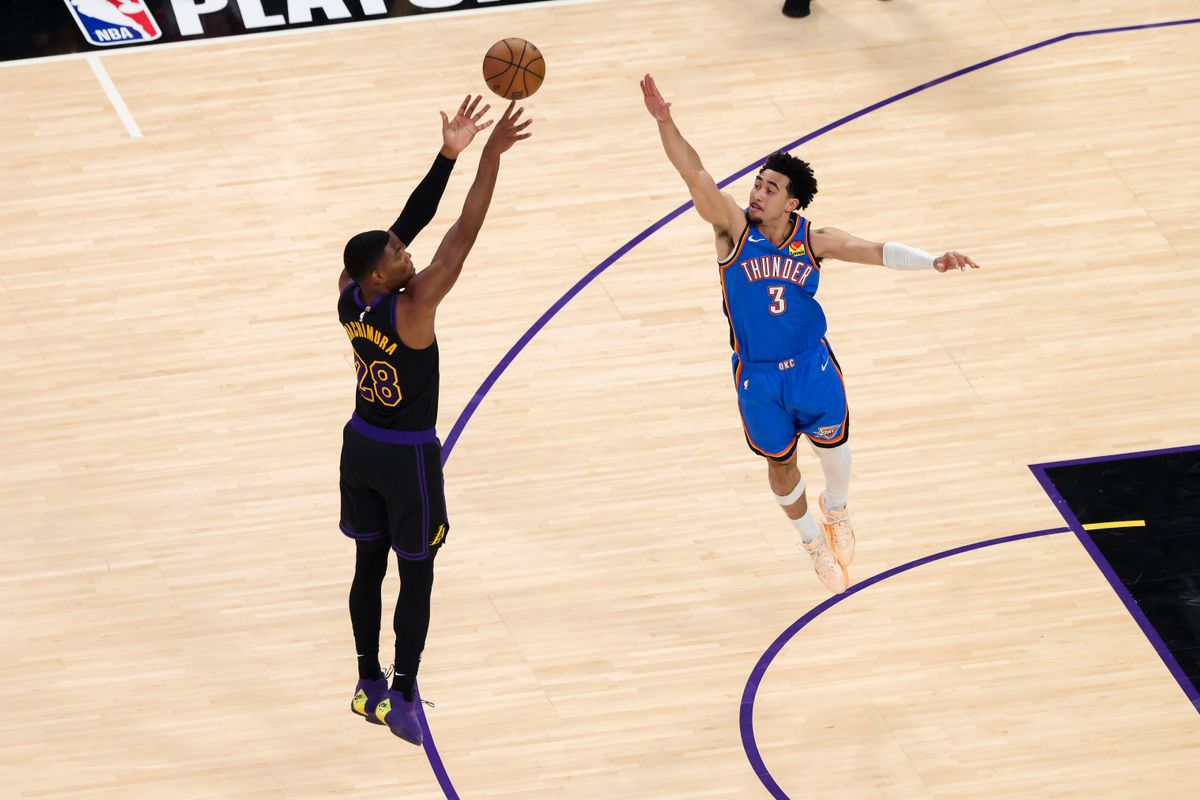 Rui Hachimura #28 of the Los Angeles Lakers shoots the ball over Jared McCain #3 of the Oklahoma City Thunder during an NBA Playoffs basketball game, Monday May 11, 2026 in Los Angeles, Calif.