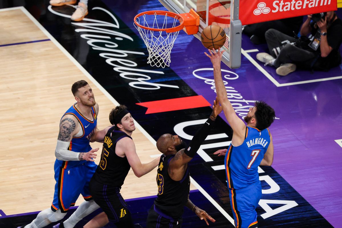 Chet Holmgren #7 of the Oklahoma City Thunder shoots the ball over LeBron James #23 of the Los Angeles Lakers during an NBA Playoffs basketball game, Monday May 11, 2026 in Los Angeles, Calif.