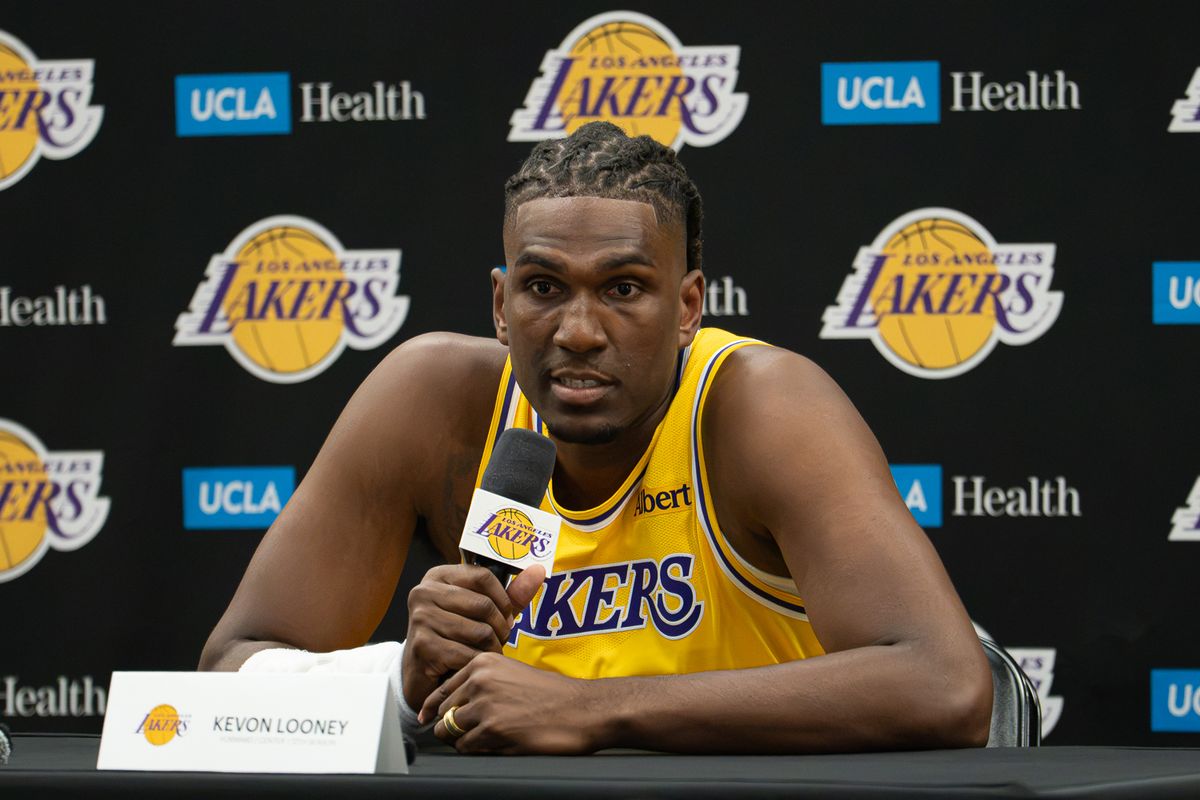 Los Angeles Lakers forward Kevon Looney (55) answers questions during Media Day at the UCLA Health Training Center, Monday, Sept. 28, 2026, in El Segundo, California. Los Angeles Lakers forward Kevon Looney (55) answers questions during Media Day at the UCLA Health Training Center, Monday, Sept. 28, 2026, in El Segundo, California.