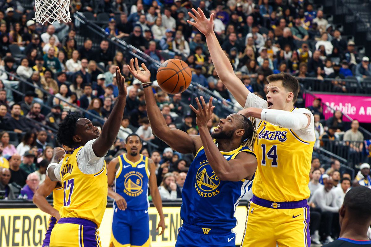 Los Angeles Lakers center Walker Kessler (14) blocks a shot by Golden State Warriors center Charles Bassey (28) during the second quarter of a basketball game between the Golden State Warriors and Los Angeles Lakers at T-Mobile Arena in Las Vegas, NV, Tuesday, Oct. 13, 2026. Los Angeles Lakers center Walker Kessler (14) blocks a shot by Golden State Warriors center Charles Bassey (28) during the second quarter of a basketball game between the Golden State Warriors and Los Angeles Lakers at T-Mobile Arena in Las Vegas, NV, Tuesday, Oct. 13, 2026.