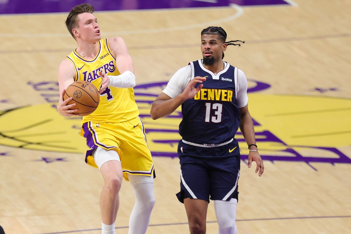 Los Angeles Lakers G Dalton Knecht (4) drives the lane during an NBA basketball game against the Denver Nuggets, Friday October 16, 2026 in Los Angeles, Calif.