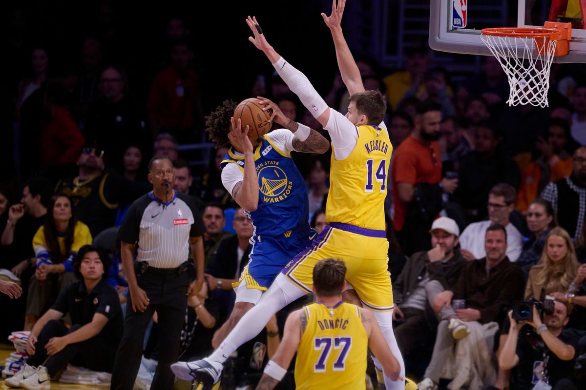 The Los Angeles Lakers center Walker Kessler (14) blocks the ball during an NBA basketball game against The Golden State Warriors on October 21st, 2026 at crypto Arena in Los Angeles, California The Los Angeles Lakers center Walker Kessler (14) blocks the ball during an NBA basketball game against The Golden State Warriors on October 21st, 2026 at crypto Arena in Los Angeles, California