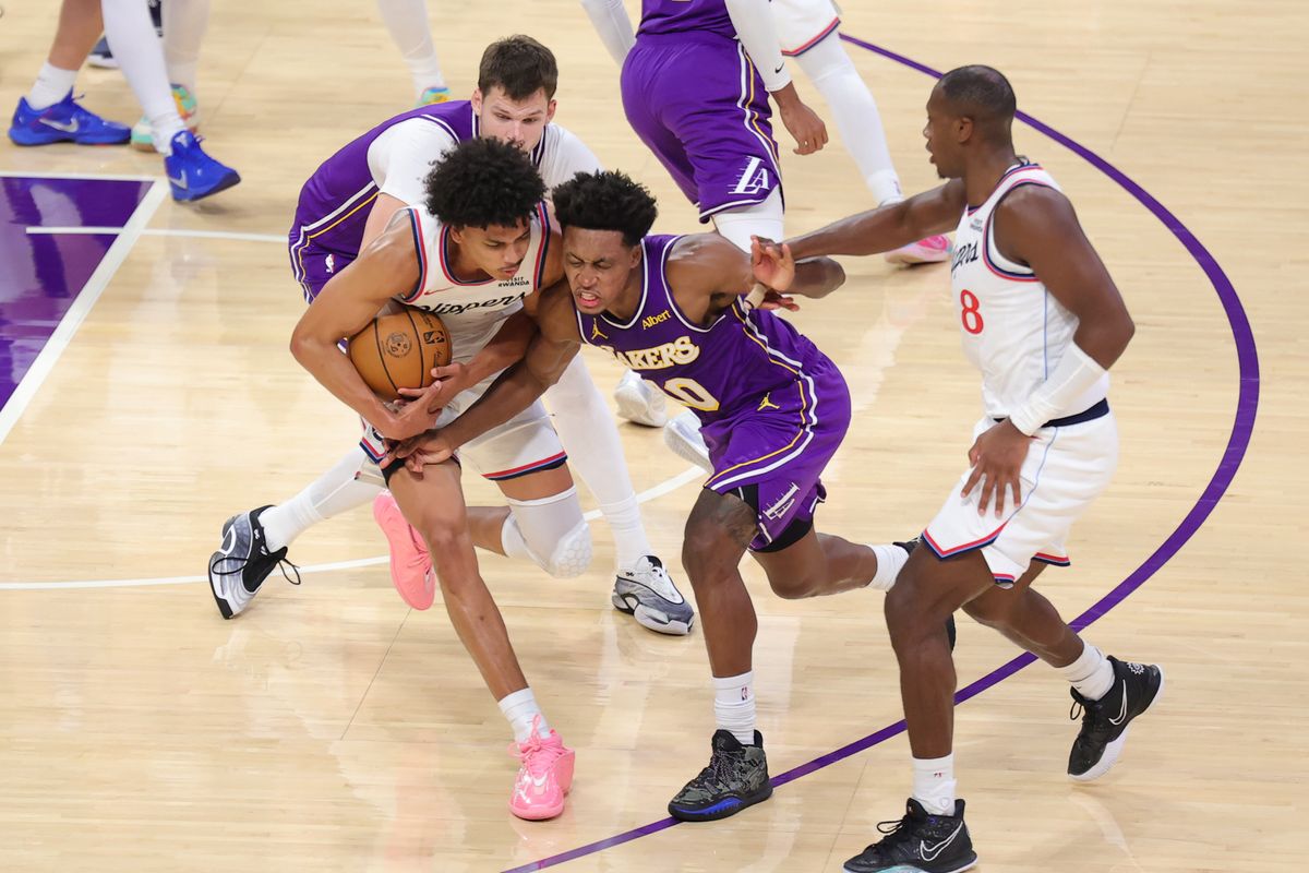 Los Angeles Clippers G/F Kobe Sanders (4) battles Los Angeles Lakers G Collin Sexton (10) for possession of the basketball during an NBA basketball game, Friday October 23, 2026 in Los Angeles, Calif. Los Angeles Clippers G/F Kobe Sanders (4) battles Los Angeles Lakers G Collin Sexton (10) for possession of the basketball during an NBA basketball game, Friday October 23, 2026 in Los Angeles, Calif.
