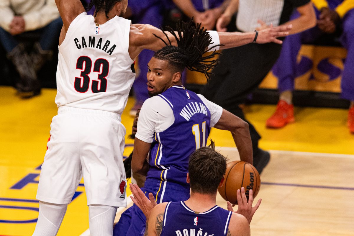 Los Angeles Lakers forward Ziaire Williams (11) makes a behind a back pass to Luka Doncic during an NBA basketball game against Portland Trailblazers, Tuesday, October 27, 2026 in Los Angeles. Los Angeles Lakers forward Ziaire Williams (11) makes a behind a back pass to Luka Doncic during an NBA basketball game against Portland Trailblazers, Tuesday, October 27, 2026 in Los Angeles.