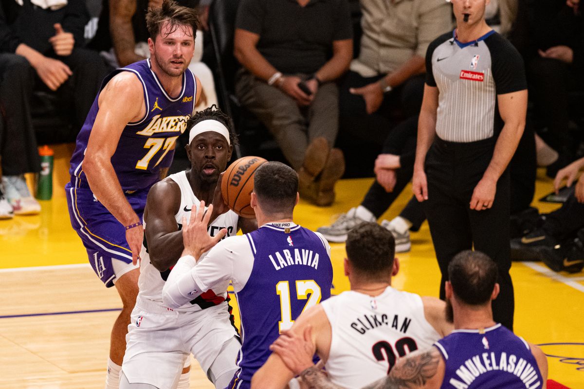 Portland Trailblazers guard Jrue Holiday (5) drives down the baseline during an NBA basketball game against Los Angeles Lakers, Tuesday, October 27, 2026 in Los Angeles. Portland Trailblazers guard Jrue Holiday (5) drives down the baseline during an NBA basketball game against Los Angeles Lakers, Tuesday, October 27, 2026 in Los Angeles.