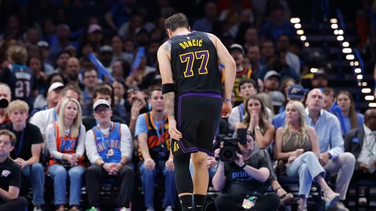 Apr 2, 2026; Oklahoma City, Oklahoma, USA; Los Angeles Lakers guard Luka Doncic (77) hops to the side of the court during a play against the Oklahoma City Thunder during the second half at Paycom Center. 