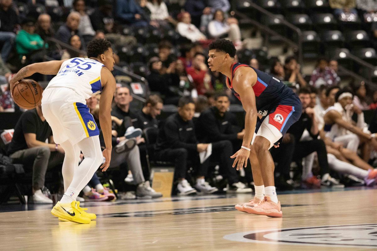 SC Warriors guard Chance McMillian (55) dribbles while SD Clippers guard RayJ Dennis (7) defends during a G-League basketball game between the Santa Cruz Warriors and the San Diego Clippers Sunday, Dec. 14, 2025 at Frontwave Arena in Oceanside, CA. 