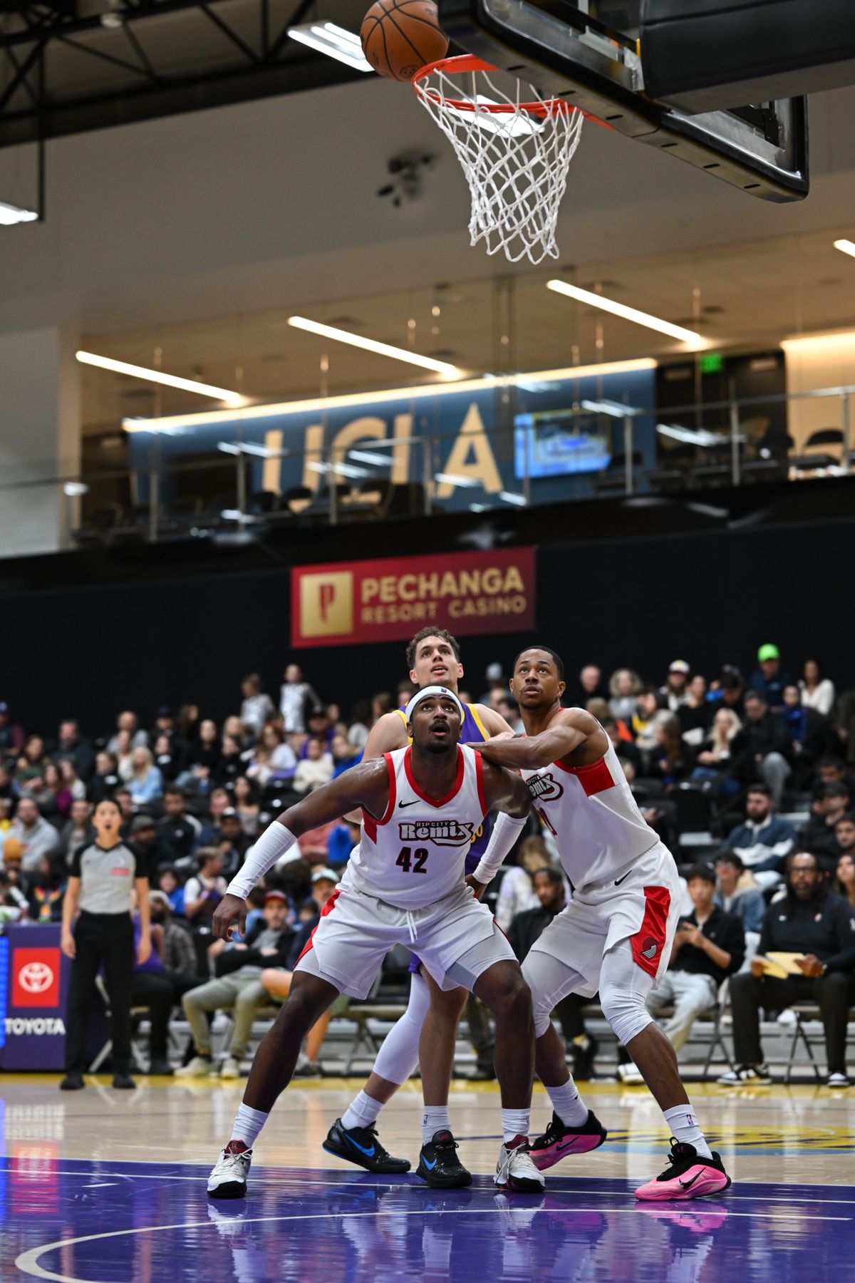 Rip City Remix forward Blake Hinson boxes out for a rebound during an NBA G League game on Sunday, November 16, 2025 in El Segundo, Calif.