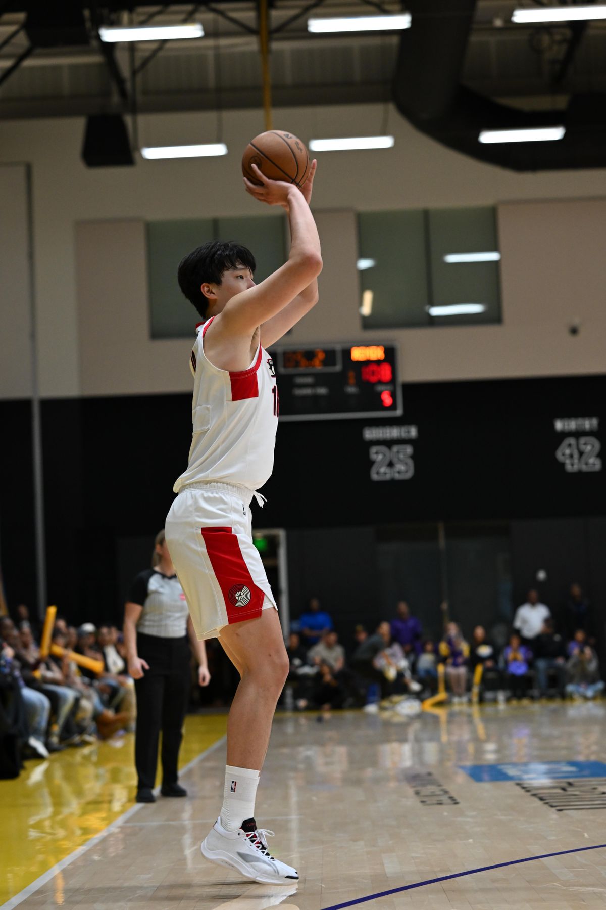 Rip City Remix center Yang Hanses shoots a three pointer  during an NBA G League game on Sunday, November 16, 2025 in El Segundo, Calif.