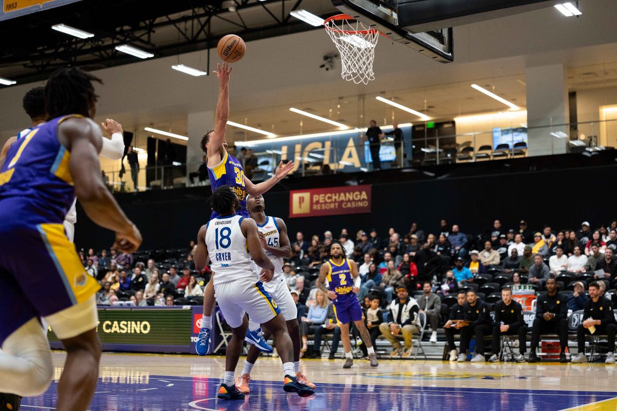 South Bay Lakers guard Chris Mañon (30) puts up a shot during an NBA G League basketball game against the Santa Cruz Warriors on Friday, Nov. 21, 2025, in El Segundo, Calif.
