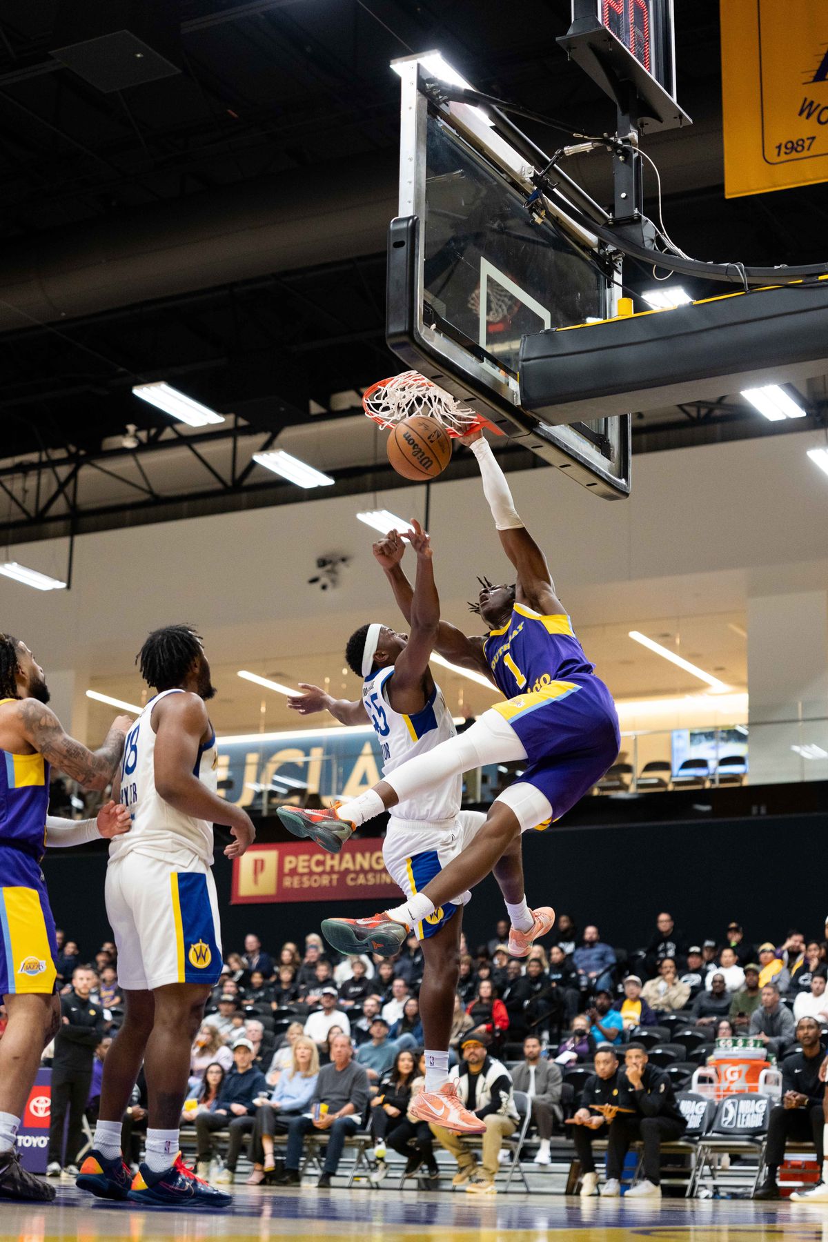 South Bay Lakers forward Adou Theiro (1) dunks the ball during an NBA G League basketball game against the Santa Cruz Warriors on Friday, Nov. 21, 2025, in El Segundo, Calif.