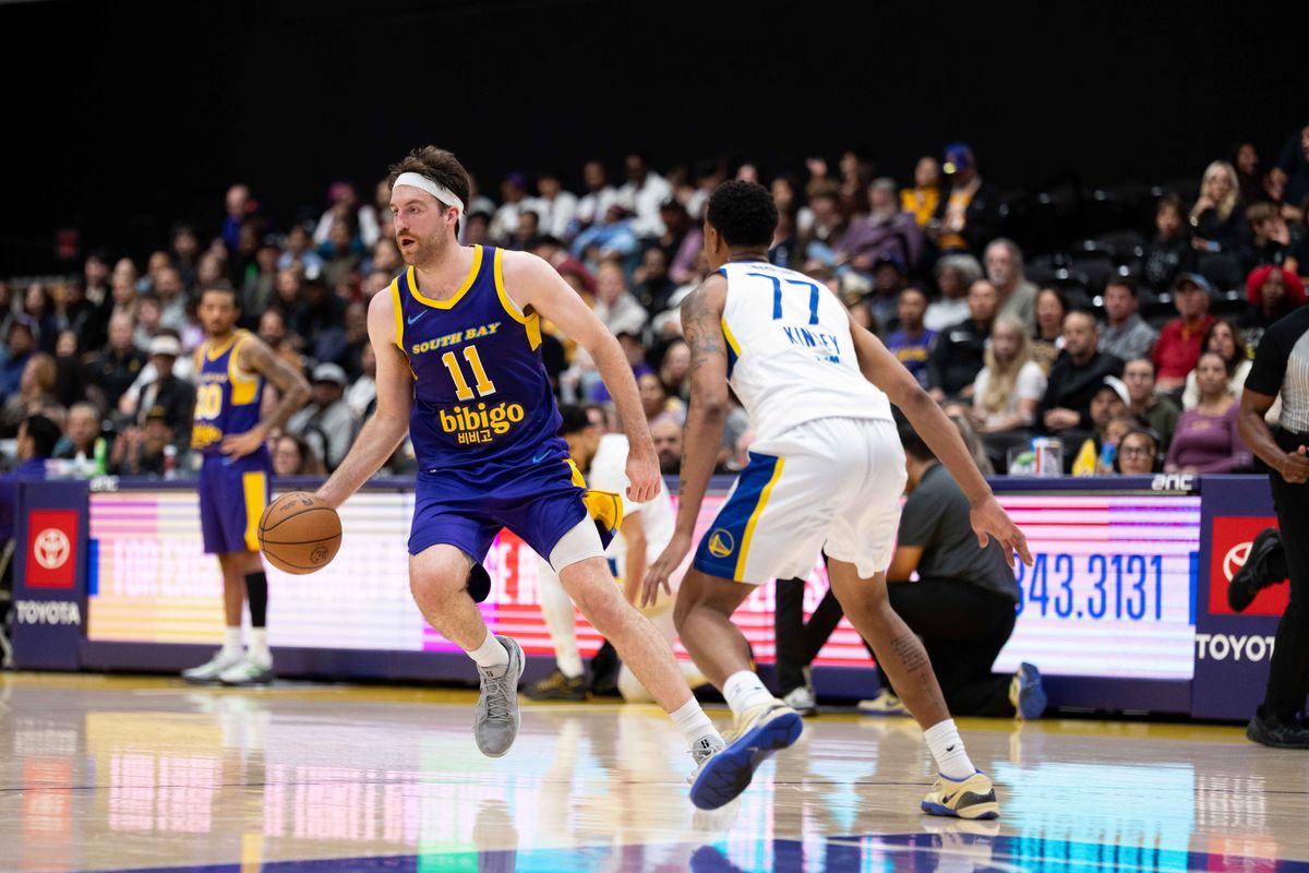 South Bay Lakers forward Drew Timme (11) dribbles against a defender during an NBA G League basketball game against the Santa Cruz Warriors on Friday, Nov. 21, 2025, in El Segundo, Calif.