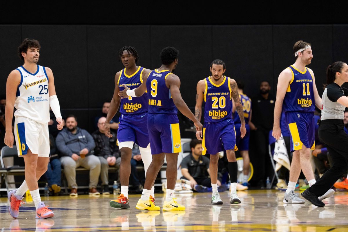 South Bay Lakers forward Adou Theiro (1) and guard Bronny James Jr. (9) high-five each other after a made shot during an NBA G League basketball game against the Santa Cruz Warriors on Friday, Nov. 21, 2025, in El Segundo, Calif.