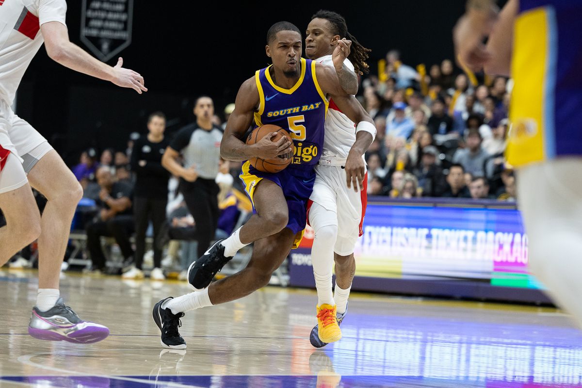 South Bay Lakers guard Tevian Jones (5), drives to the basket during an NBA G League basketball game against the Memphis Hustle, Saturday, January 3, 2026, in El Segundo, Calif.