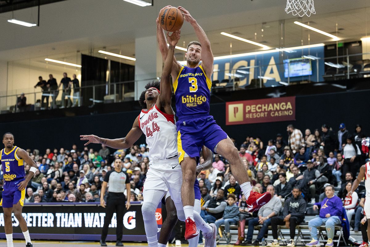 South Bay Lakers guard Augustas Marčiulionis (3), defends during an NBA G League basketball game against the Memphis Hustle, Saturday, January 3, 2026, in El Segundo, Calif.