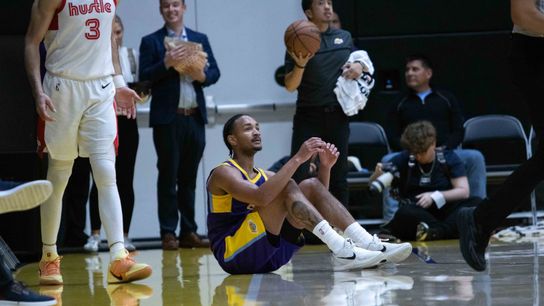 South Bay Lakers guard Kobe Bufkin (6) waits for his teammates to help him up during a G-League basketball game between the South Bay Lakers and Memphis Hustle Tuesday, January 6, 2026 at UCLA Health Training Center in El Segendo, Calif. 
