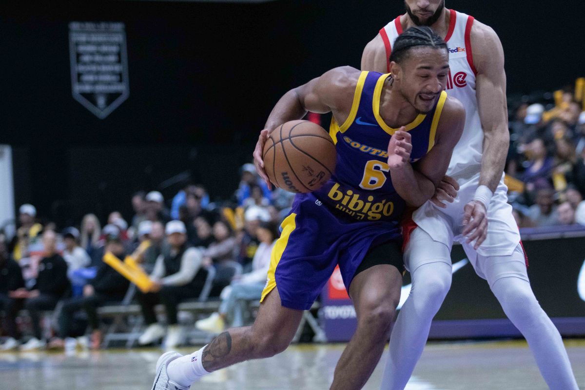 South Bay Lakers guard Kobe Bufkin (6) drives against a Memphis Hustle defender during a G-League basketball game between the South Bay Lakers and Memphis Hustle Tuesday, January 6, 2026 at UCLA Health Training Center in El Segendo, Calif. 