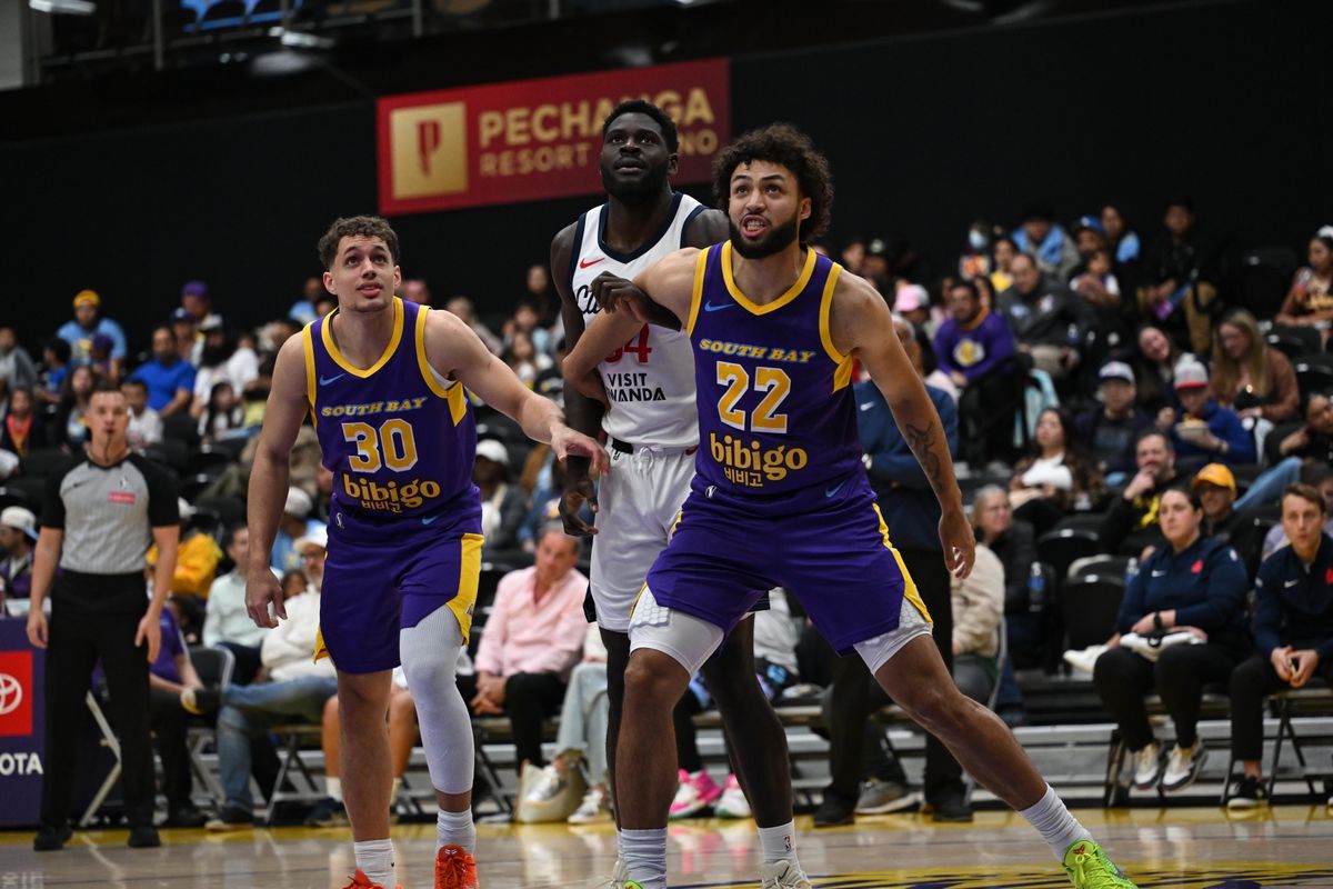 South Bay Lakers Forward Anton Watson (22) and Center Kylor Kelley (33) box out for a rebound during a G-League basketball game between the South Bay Lakers and San Diego Clippers Wednesday, January 14, 2026 at UCLA Health Training Center in El Segundo, Calif.