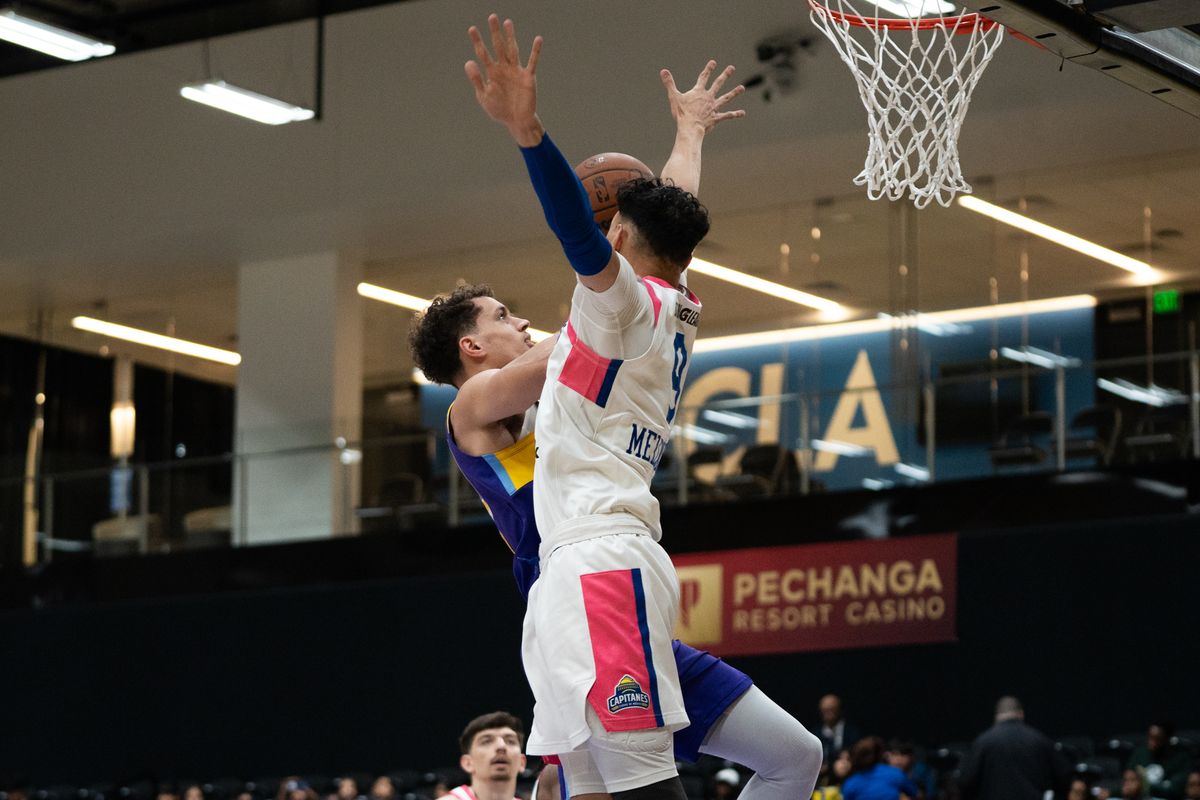South Bay Lakers Guard Chris Manon (30) attacks the rim and scores on a contested lay up during a G-League basketball game against Mexico City Capitanes Thursday, January 22, 2026 at UCLA Health Training Center in El Segundo, Calif.