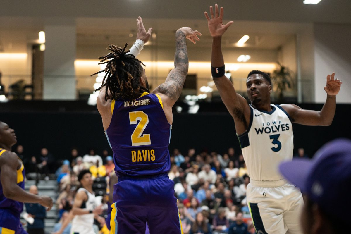 South Bay Lakers guard RJ Davis (2) shoots a three over his defender during an NBA G-League basketball game against the Iowa Wolves, Wednesday March 11th, 2026 in Los Angeles, California.