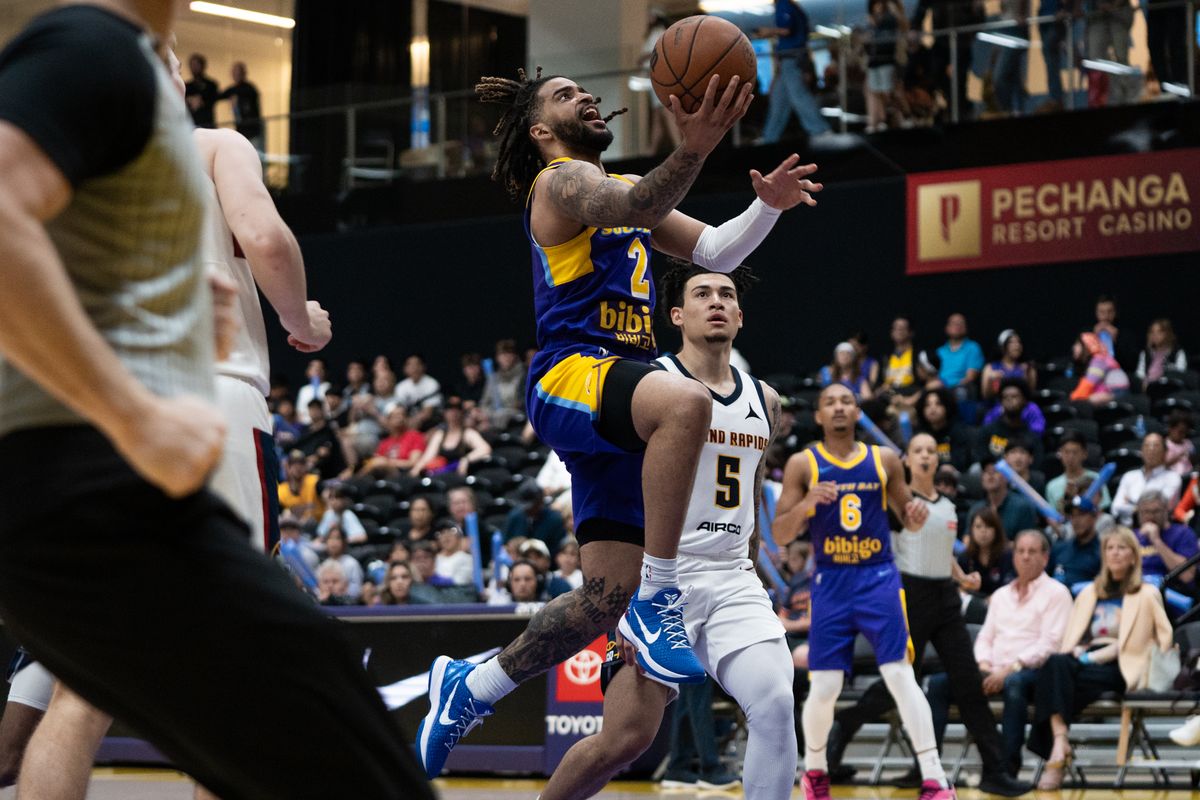 South Bay Lakers guard RJ Davis (2) splits the middle and finishes for two points during an NBA G-League basketball game against the Grand Rapids Gold, Saturday March 21st, 2026 in El Segundo California