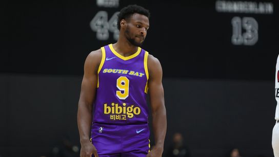 Austin Reaves left hanging by Bronny James in awkward 4th quarter moment taken at Crypto.com Arena (Lakers). Photo by Darwin Walker - The Sporting Tribune