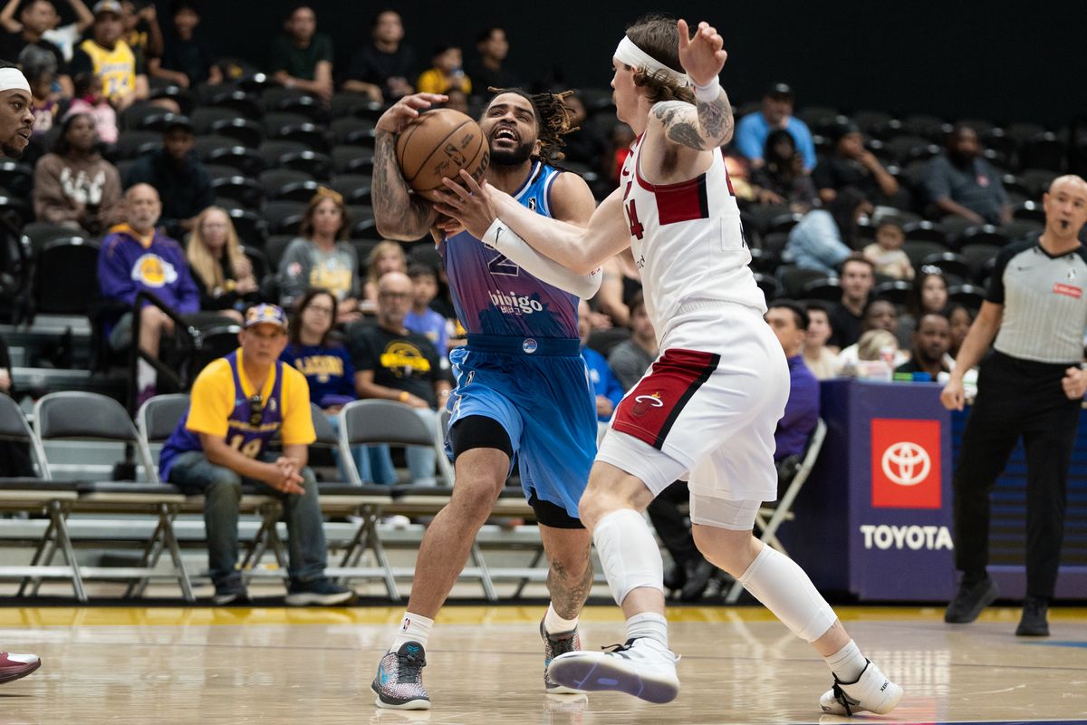 South Bay Lakers guard RJ Davis (2) attacks the rim on his defender during G League game against the Sioux Falls Skyforce on March 28, 2026 in El Segundo, CA.