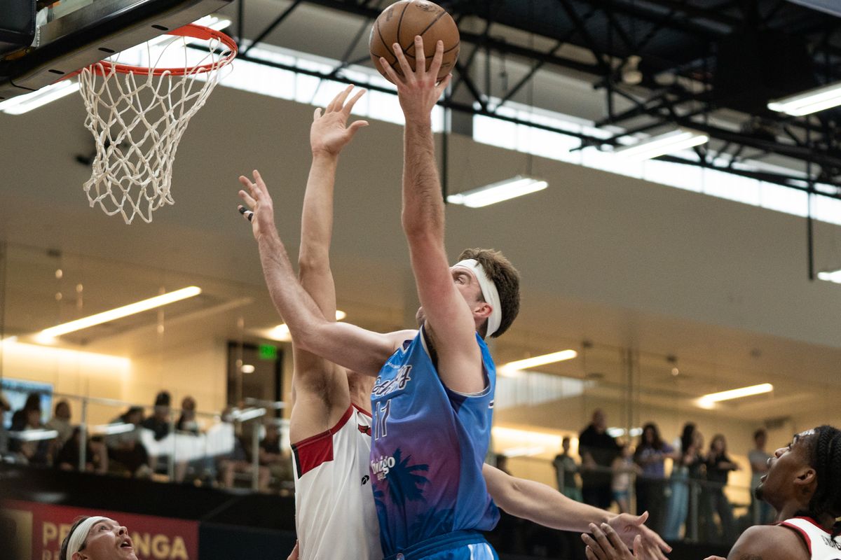 South Bay Lakers center Drew Timme (11) attacks the middle of the court and scores on a layup during G League game against the Sioux Falls Skyforce on March 28, 2026 in El Segundo, CA.
