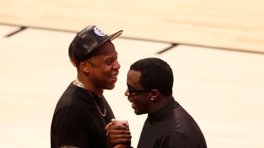 Recording artists Jay-Z (left) Sean Combs shake hands before the 2013 NBA All-Star Game at the Toyota Center. Recording artists Jay-Z (left) Sean Combs shake hands before the 2013 NBA All-Star Game at the Toyota Center.
