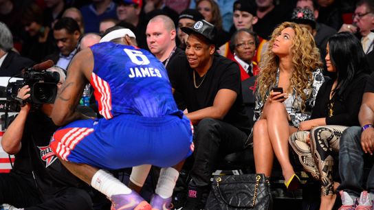 Eastern Conference forward LeBron James (6) of the Miami Heat looks towards recording artists Jay-Z (middle) and Beyonce (right) in the second quarter of the 2013 NBA all star game at the Toyota Center. Eastern Conference forward LeBron James (6) of the Miami Heat looks towards recording artists Jay-Z (middle) and Beyonce (right) in the second quarter of the 2013 NBA all star game at the Toyota Center.