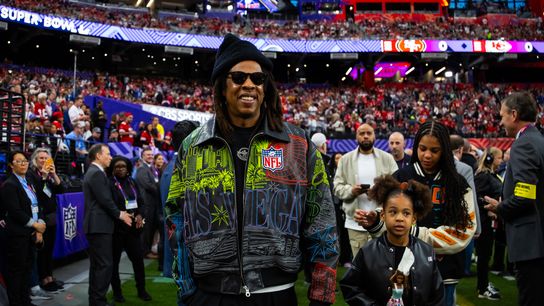 Recording artist Jay-Z walks on the field with daughter Rumi Carter before Super Bowl LVIII between the San Francisco 49ers and the Kansas City Chiefs at Allegiant Stadium. Recording artist Jay-Z walks on the field with daughter Rumi Carter before Super Bowl LVIII between the San Francisco 49ers and the Kansas City Chiefs at Allegiant Stadium.
