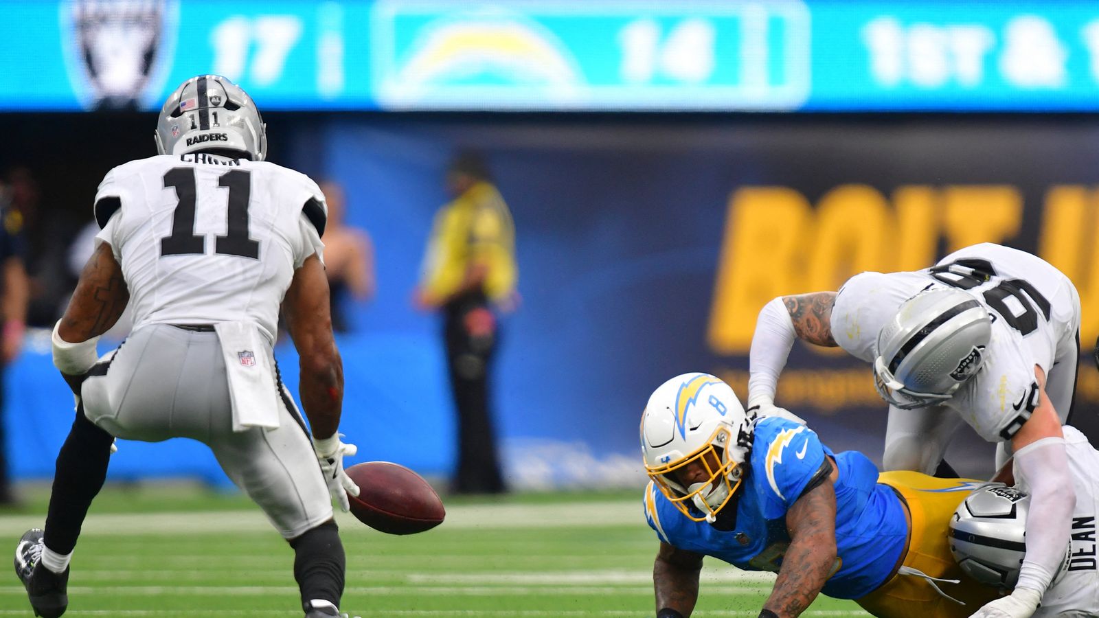 Sep 20, 2026; Inglewood, California, USA; Las Vegas Raiders safety Jeremy Chinn (11) recovers a fumble against the Los Angeles Chargers during the second half at SoFi Stadium. Sep 20, 2026; Inglewood, California, USA; Las Vegas Raiders safety Jeremy Chinn (11) recovers a fumble against the Los Angeles Chargers during the second half at SoFi Stadium.