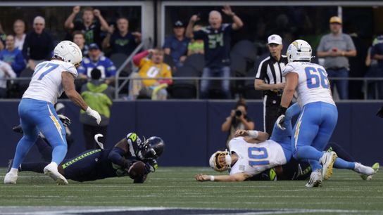 Oct 4, 2026; Seattle, Washington, USA; Seattle Seahawks linebacker Derick Hall (58) recovers a fumble from Los Angeles Chargers quarterback Justin Herbert (10) during the second half at Lumen Field. Oct 4, 2026; Seattle, Washington, USA; Seattle Seahawks linebacker Derick Hall (58) recovers a fumble from Los Angeles Chargers quarterback Justin Herbert (10) during the second half at Lumen Field.