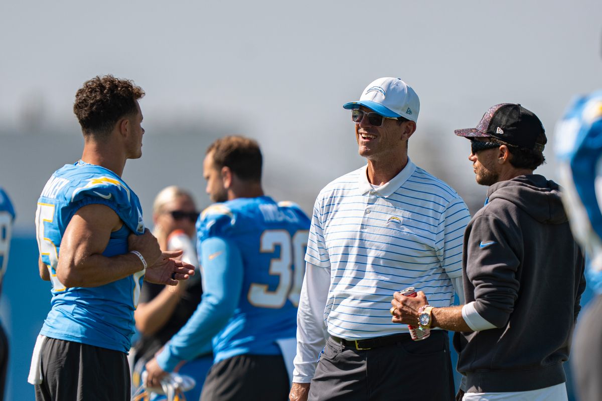 Los Angeles Chargers wide receiver Ladd McConkey (15), head coach Jim Harbaugh, and offensive coordinator Mike McDaniels during Chargers training camp at The Bolt on Friday, July 31th in El Segundo, CA. Los Angeles Chargers wide receiver Ladd McConkey (15), head coach Jim Harbaugh, and offensive coordinator Mike McDaniels during Chargers training camp at The Bolt on Friday, July 31th in El Segundo, CA.