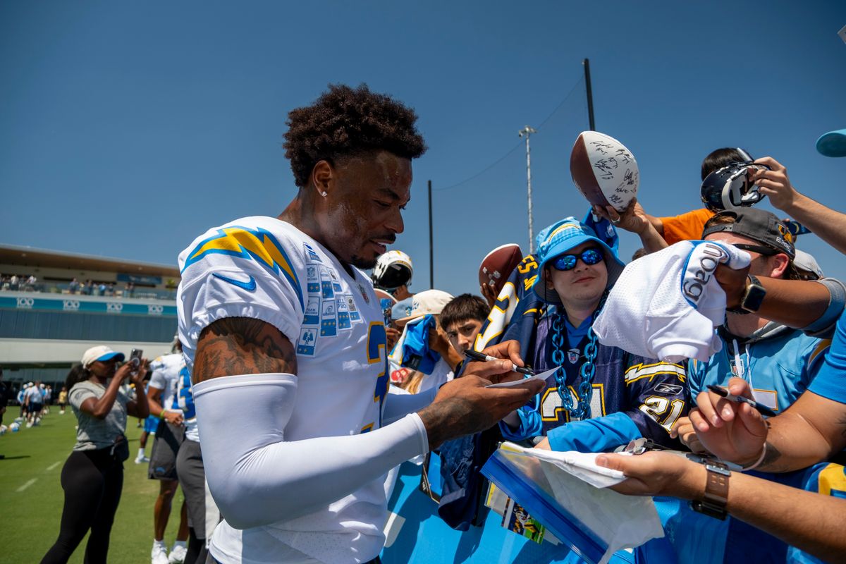 Los Angeles Chargers safety Derwin James Jr. (3) signing merchandise for fans during Chargers training camp at The Bolt on Friday, July 31st in El Segundo, CA. Los Angeles Chargers safety Derwin James Jr. (3) signing merchandise for fans during Chargers training camp at The Bolt on Friday, July 31st in El Segundo, CA.