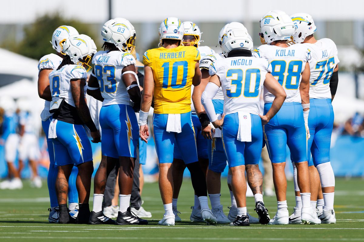 Los Angeles Chargers offensive unit group huddle during training camp at The Bolt on August 6, 2026 in El Segundo, California. Los Angeles Chargers offensive unit group huddle during training camp at The Bolt on August 6, 2026 in El Segundo, California.